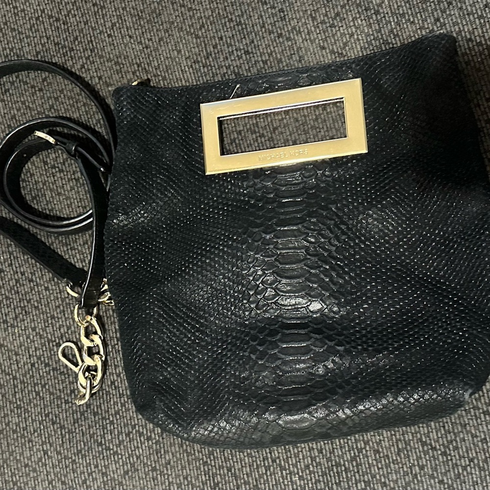 Michael Kors Berkeley Clutch/Crossbody in black python embossed leather.
